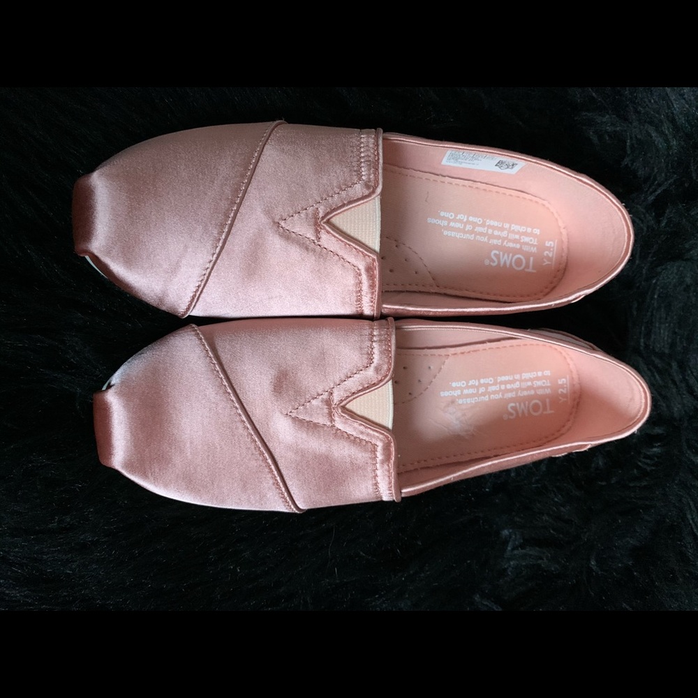 Toms rose gold slip on’s